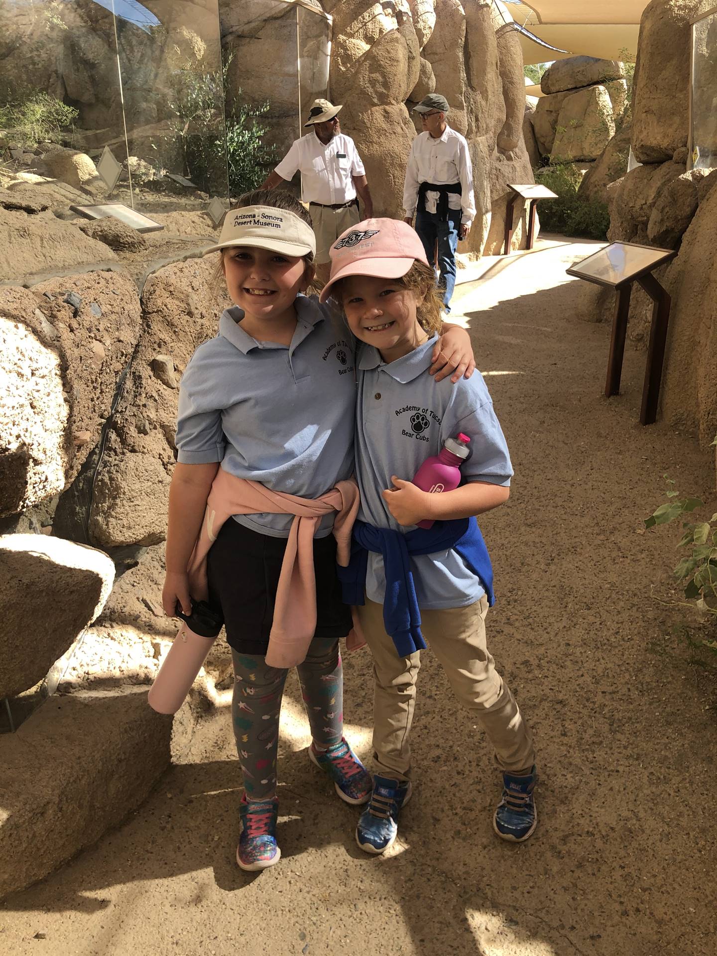 2 students pose for a desert museum picture 