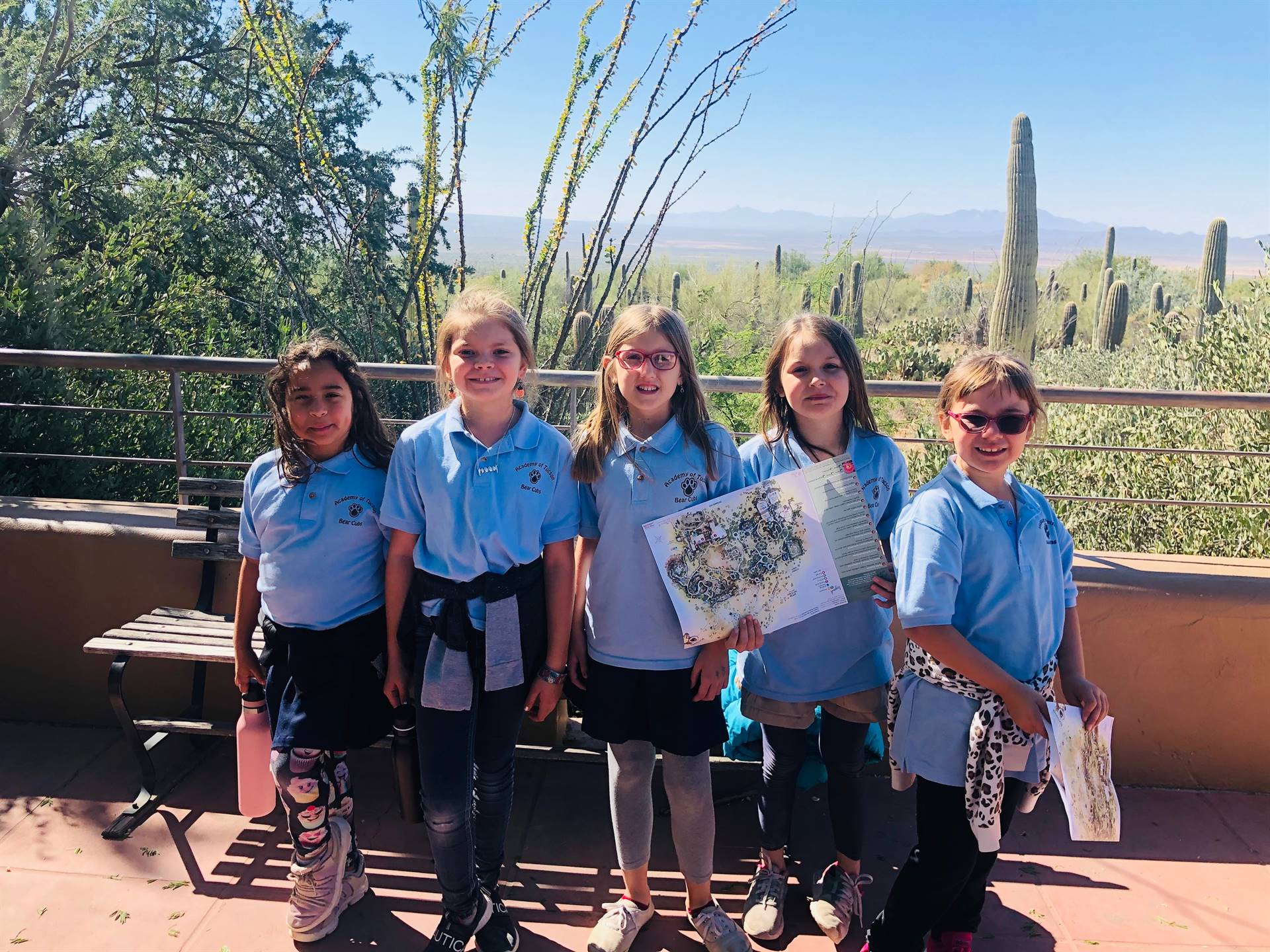Students in front of Sonoran landscape 